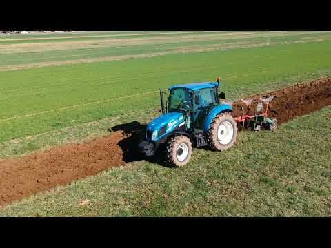 New Holland T4.75 Plowing